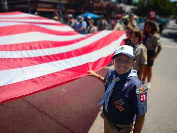 Liam holding flag